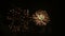 4K footage of close up real colorful fireworks festival light up in the sky at dark night scene for holiday festival