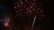 4K footage of close up real colorful fireworks festival light up in the sky at dark night scene for holiday festival and celebrate