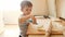4k footage of funny toddler boy learning making pie on kitchen