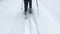 4K footage of a man on snowshoes walking on white snow