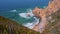 4k footage Praia do Ursa beach with beautiful orange colored cliffs on Atlantic ocean coast near popular touristic Cabo