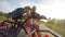 4K footage: son with father riding by the quadrocycle front camera view