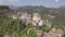 4k forwards aerial of abandoned village atop mountains, Laino Castello, Italy