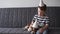 4k. Funny chihuahua dog with happy preschool boy. Birthday dog in party hat.
