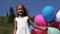 4K Girl Playing Balloons Hide and Seek in Park, Child Portrait Looking in Camera