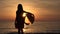 4K Girl Silhouette on Beach at Sunset, Pensive Child on Coastline at Sunrise