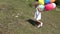 4K Girl Waling with Balloons on Meadow, Happy Child Playing Outdoor in Summer