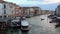 4K. Grand Canal Venice, canal with gondolas, boats and vaporettos. Rialto bridge