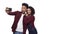 4k - Happy cheerful afro american couple making a selfie and watching made photos isolated over white background