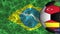 4K High Definition Video of flags printed soccer ball revolving on realistic wavy Brazil flag