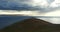 4k huge dark clouds mass rolling over lake namtso & mountain,tibet mansarovar.