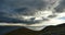 4k huge dark clouds mass rolling over lake namtso & mountain,tibet mansarovar.