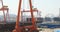 4k Industrial working crane bridge in shipyard.