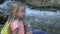 4K Kid Drinking Water, Happy Child at Creek, Girl Drinks Water at River in Mountains