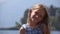 4K Kid Portrait, Happy Little Girl Looking in Camera on Beach, Child at Seashore