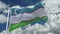 4k looping flag of Uzbekistan waving in wind,timelapse rolling clouds background.