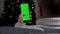 4K A man uses a smartphone with a green screen on the background of a Christmas tree.