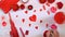 4K. Many hearts drawn on a paper. Red palette. Valentines or Mothers Day concept.