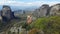 4K. Meteora rocks, Greece. Panoramic view to valley of Thessaly with monasteries on cliff