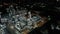 4K Night aerial view around oil refinery