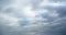4k Panoramic of dark altocumulus clouds smoke slowly flying in cloudy sky.