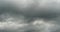 4k Panoramic of dark altocumulus clouds smoke slowly flying in cloudy sky.