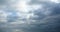 4k Panoramic of dark altocumulus clouds smoke slowly flying in cloudy sky.