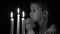 4K Pensive Sad Child Face Saying Prayer Candles, Upset Girl Face, Night Vintage