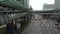 4K People walking suspended footbridge crossroad traffic street in Hong Kong