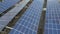 4K Rows of photovoltaic panels on a flat roof