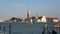 4K. San Giorgio Maggiore seen from San Marco, Venice. Gondolas and boats in sea.