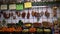 4K, Sausages and vegetables in butcher shop. Fruits and dried smoked meat