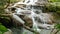 4K seamless loop. Erawan waterfall , popular famous tourist attraction in Kanchanaburi, Thailand. Erawan waterfall is a waterfall