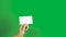 4K. set of woman hand showing blank white business name card paper in 3 different actions isolated on chroma key green screen