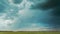 4K Sky During Rain Horizon Above Rural Wheat Landscape Field. Agricultural And Weather Forecast Concept. Storm, Thunder