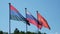 4K slow motion footage. Three flags of Republic Karelia, Russian Federation and Russian Railways are fluttering in wind