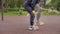 4K slow motion Mother and daughter doing exercises on open air sport playground. Sportive family