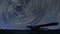 4K Spiral Star trails over small airport