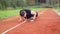 4k still video of young fit man doing push ups in the morning outdoor on the running race track