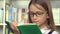 4K Student Girl, Child Face Reading Books in Library, Children School Education