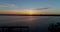 4K Sunrise Lake and Dock Drone Rising Up