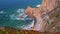4K surreal and bizarre towering rocks at Praia Da Ursa Beach, Sintra, Portugal. Atlantic ocean coast near famous Cabo Da