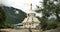 4k tibet people walking around buddhist white stupa in village.