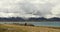 4k Tibetans walking the pilgrim at the lake namtso in tibet,snow mountain.