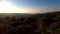 4k tilt down vertical Pano video. View of forest, sea, and city under a blue sky. A view of Mount Carmel