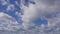 4K Time lapse clip of white fluffy clouds over blue sky, Running clouds