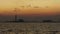 4K Time-lapse : Oil refinery factory in silhouette and sunset sea sky, Thailand.