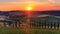 4K Time lapse sunset over the rolling hills and winding road in Tuscany, Italy