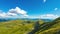 4k time lapse video of beautiful mountain scenery with rolling clouds against blue sky