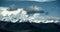 4k timelapse huge clouds mass rolling over lake namtso & snow mountain in tibet.